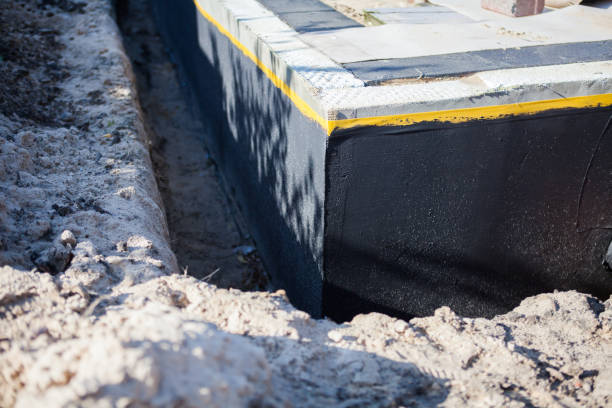 Professional Exterior Waterproofing technician working in Lansdowne, VA